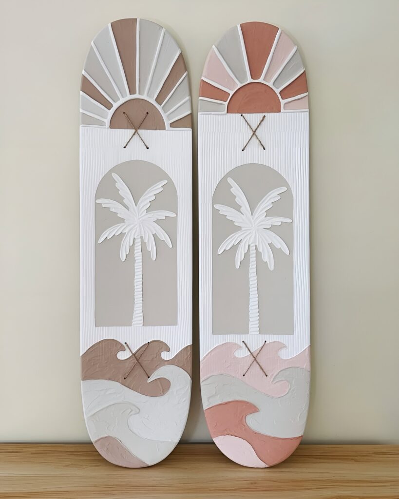 A pastel-toned girls bedroom featuring skateboard wall art with beachy, coastal-inspired accents like surf colors and relaxed decor elements.