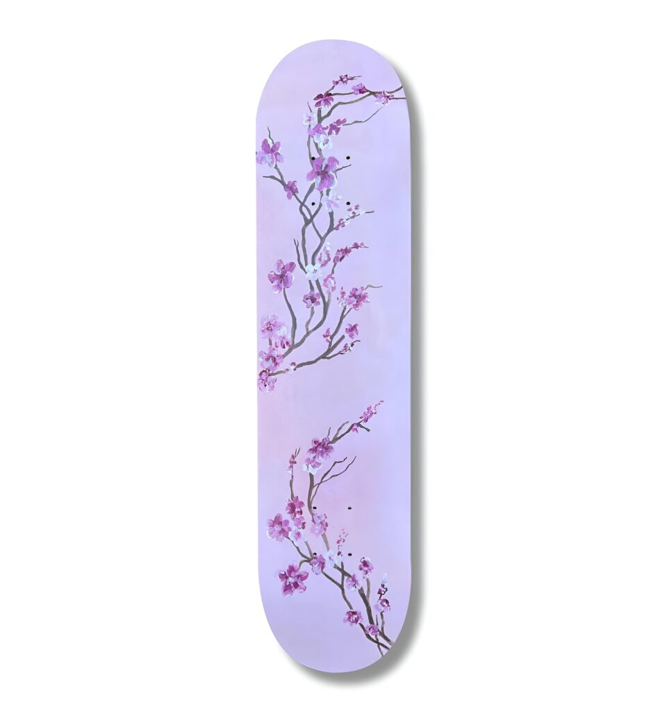 A girls bedroom features skateboard wall art flower design with soft purple floral patterns set against a light purple background, adding a dreamy botanical vibe to the space.