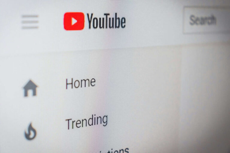 Close-up of YouTube homepage menu, representing daily life vlogs Tokyo salaryman content creation.